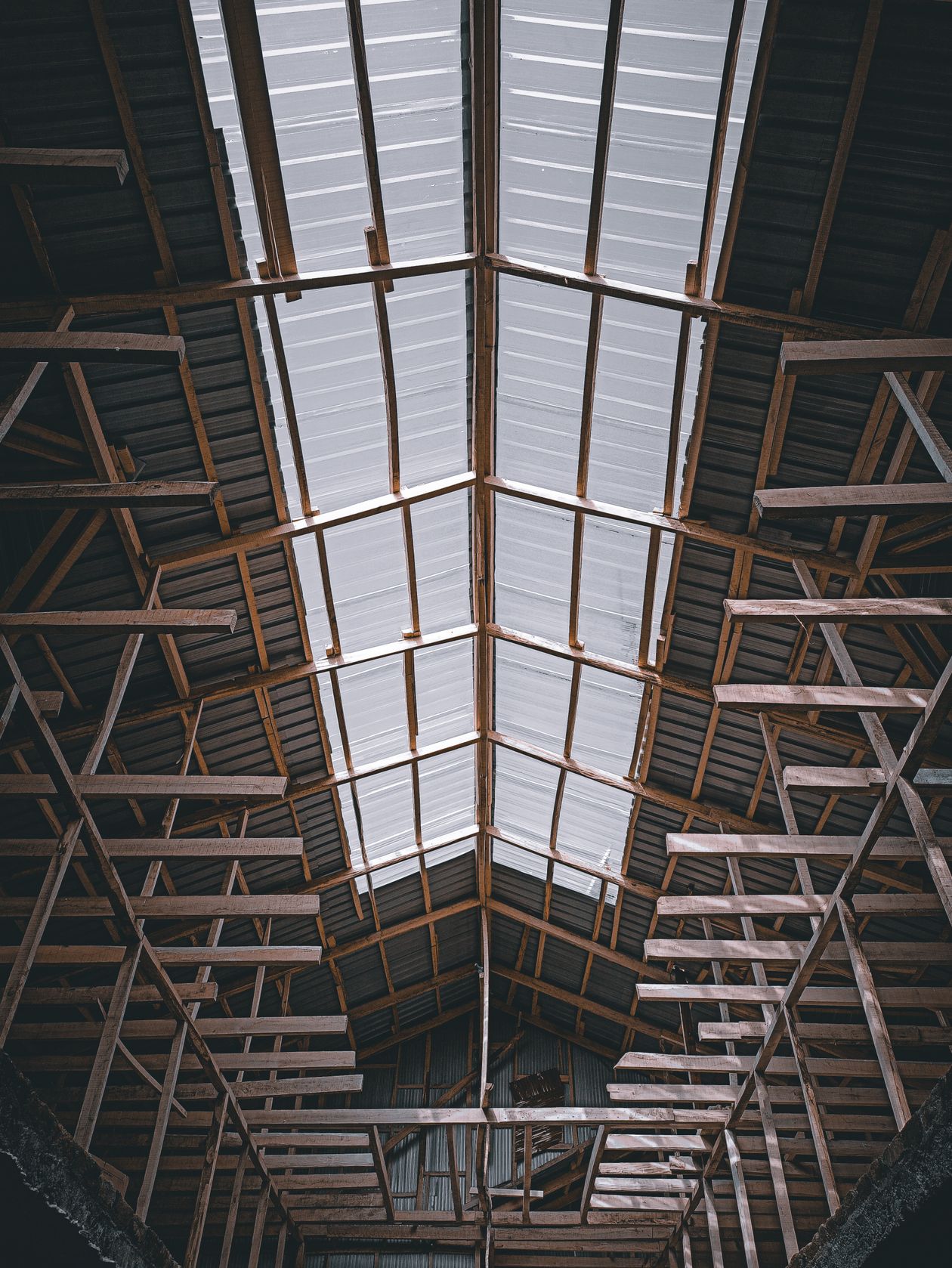 Wooden roof structure viewed from below
